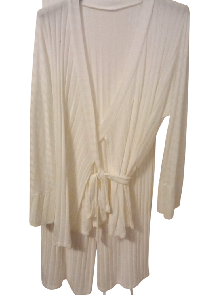 Completo maglione con cintura e pantaloni a zampa d'elefante