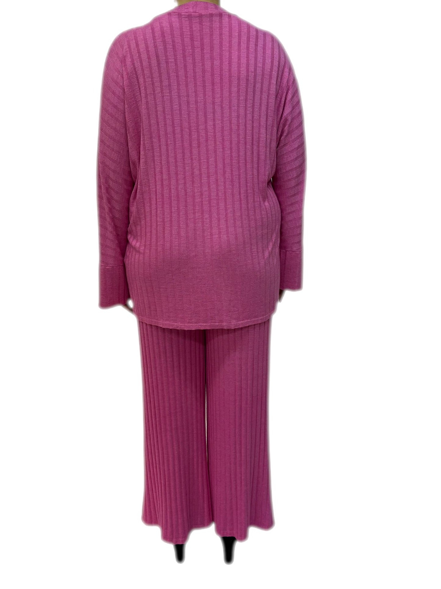 Completo maglione con cintura e pantaloni a zampa d'elefante