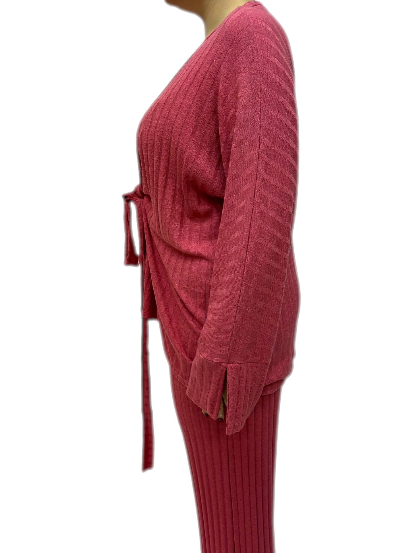 Completo maglione con cintura e pantaloni a zampa d'elefante
